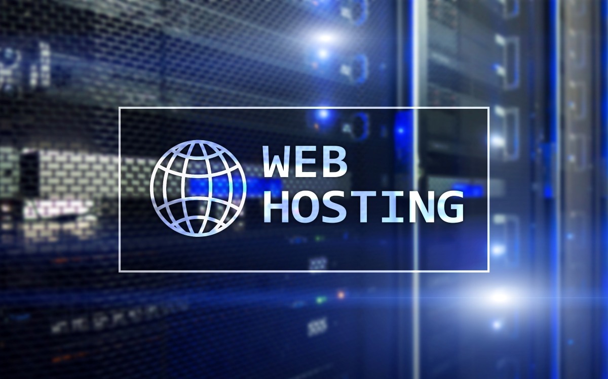 A web hosting sign in front of a server offering Managed WordPress and Shared Hosting options.