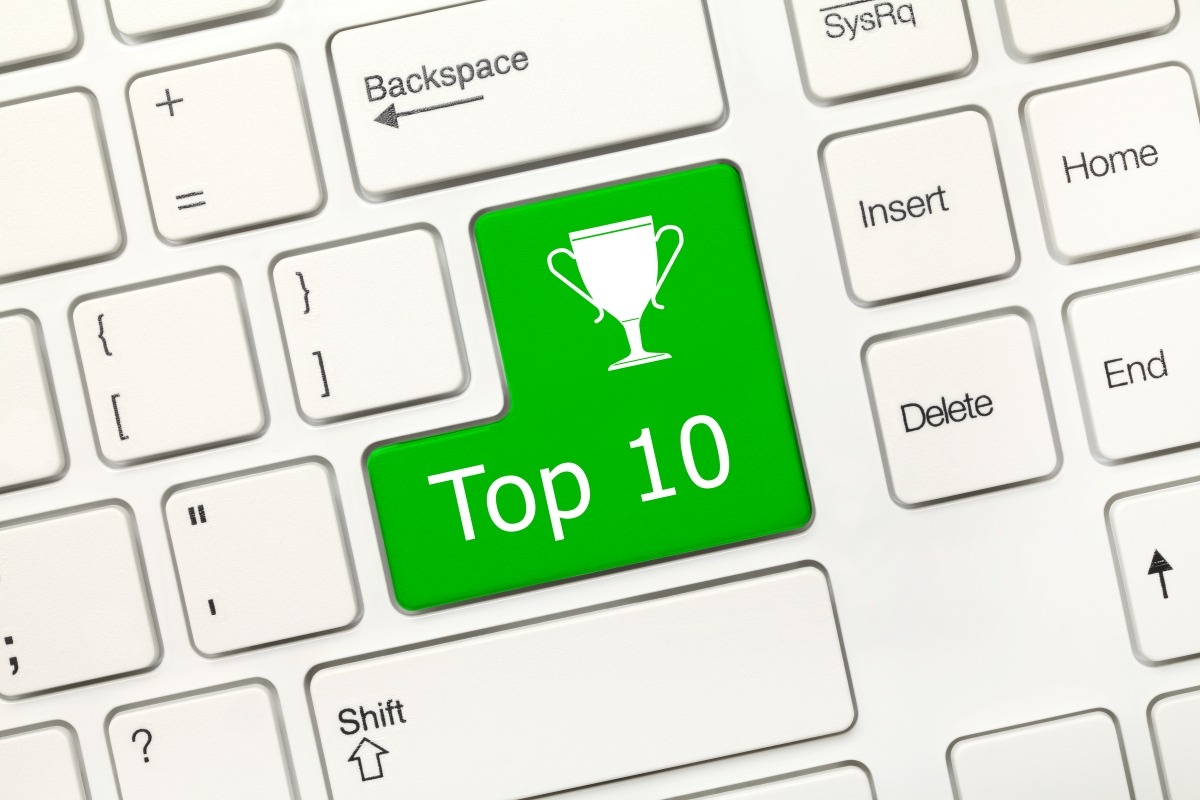 A green button with the word top 10 on it, available for free in WordPress.